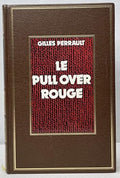 Le pull over rouge